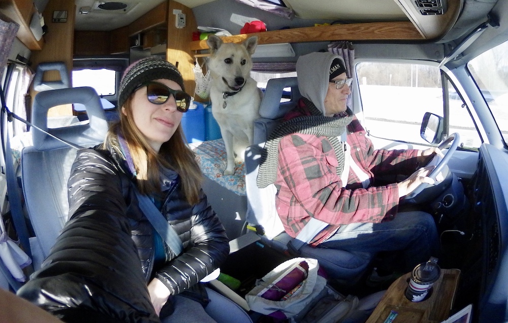 couple travels with dog in dog-friendly van
