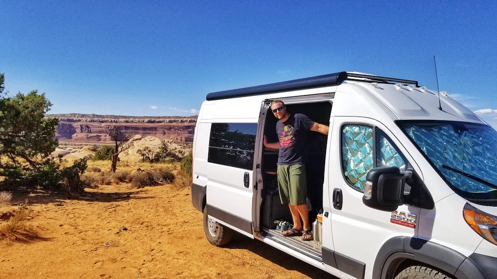 man in camper van door - choose your new van