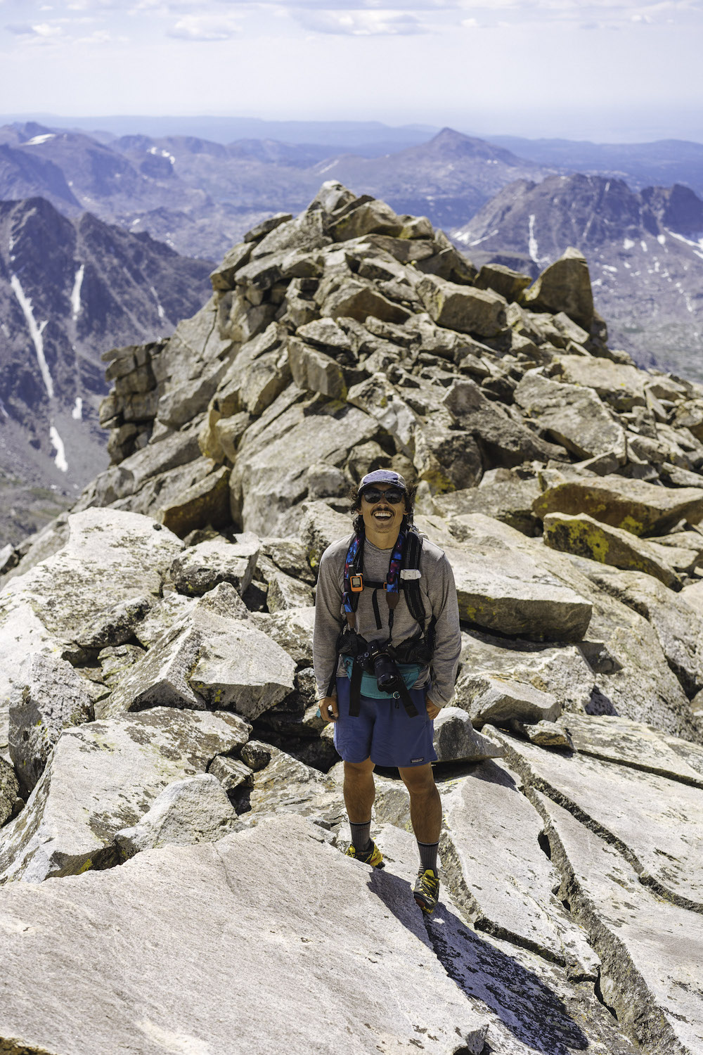 man on top of mountain - a summer adrift