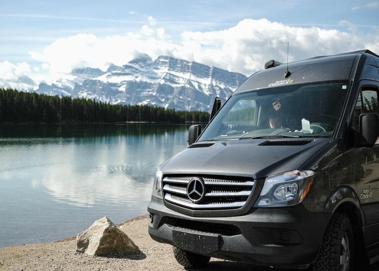 sprinter van with lake and mountains