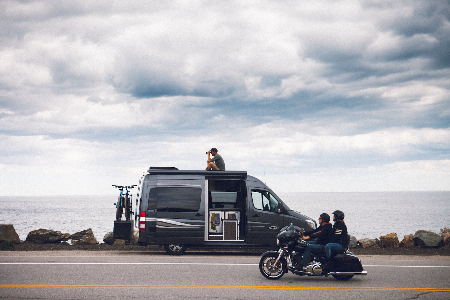 Mercedes sprinter and motorcycle with view